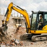 Mini excavator performing demolition work
